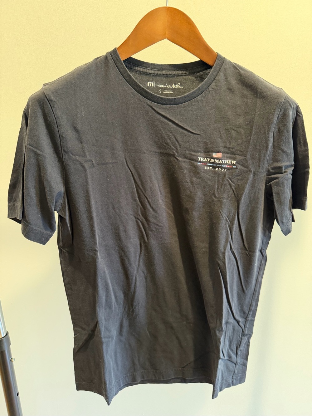 Travis Mathew black Crew Neck Tee with Small Chest Logo